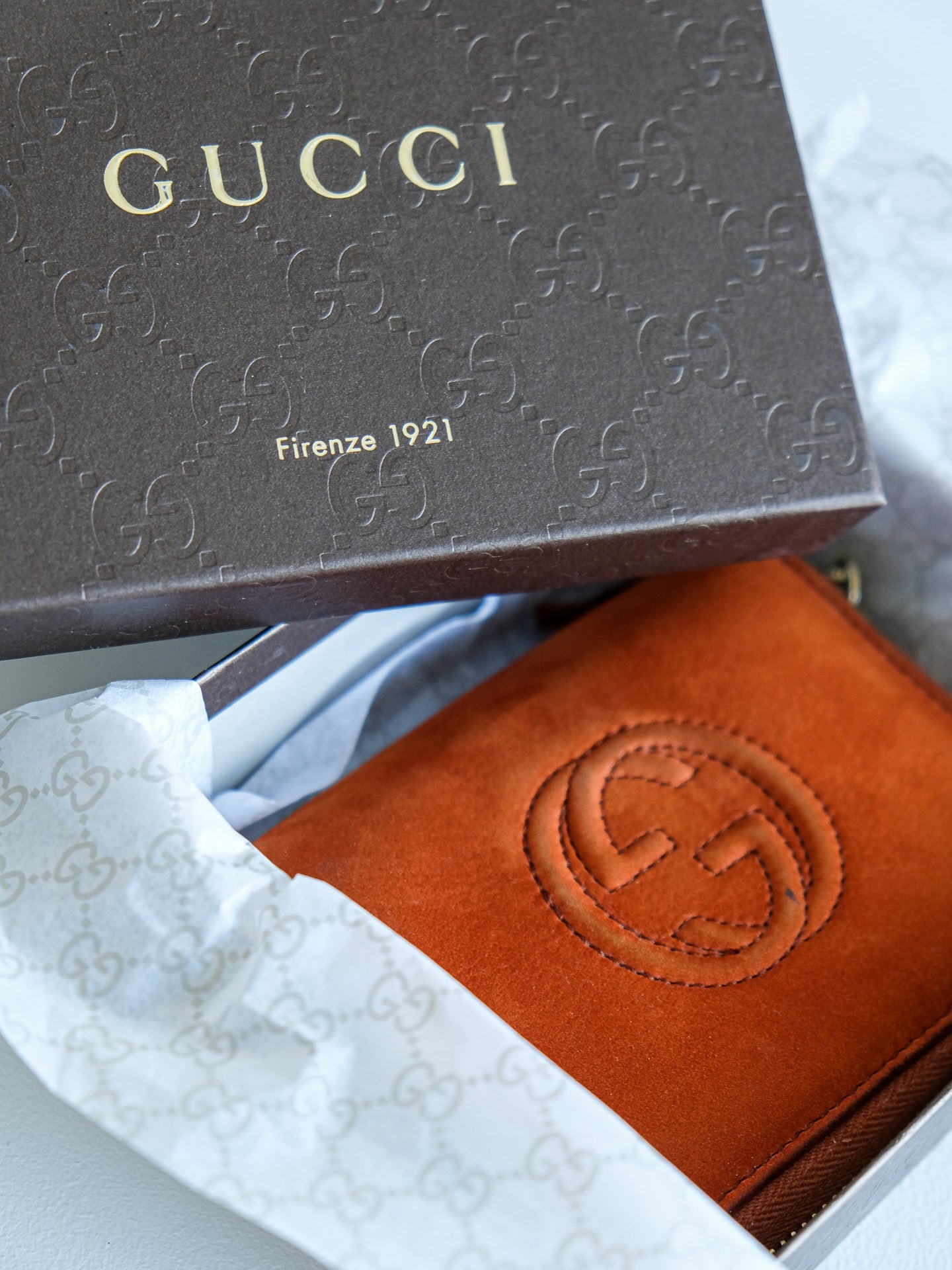 Kuletë me tufë portokalli për femra Gucci